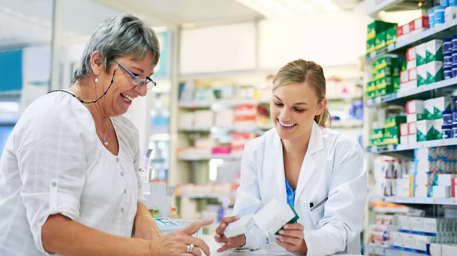 pharmacist helping customer