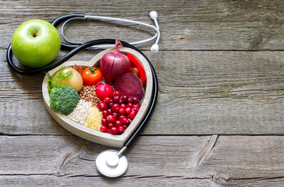 heart-healthy foods in heart shape with stethoscope